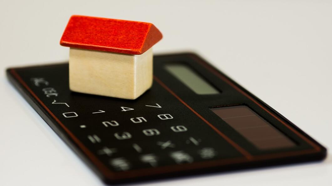 Huis met rekenmachine